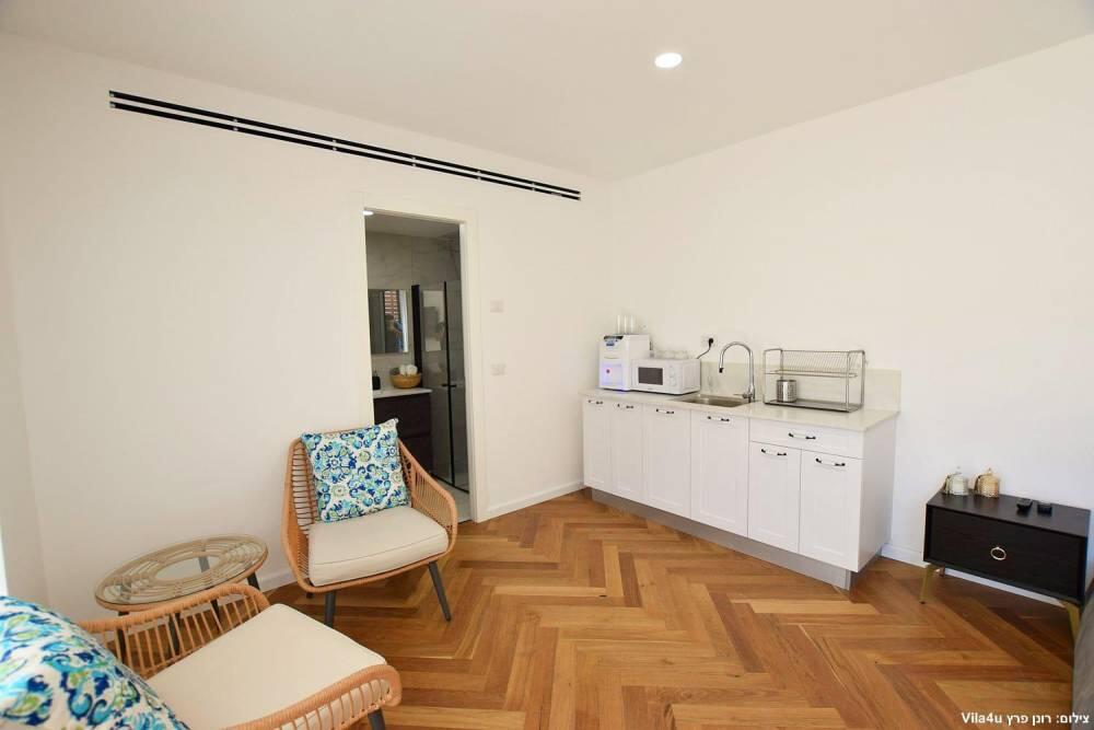 אחוזת yoli איוונטס מרכז  18  לופט לנד